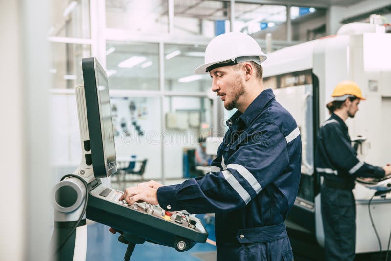 Metal Lathe CNC Machine Engineer Worker. Engineering Staff Working in