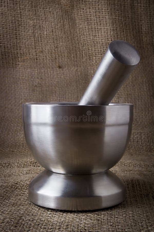 Metal mortar and pestle stock photo. Image of color 170163040
