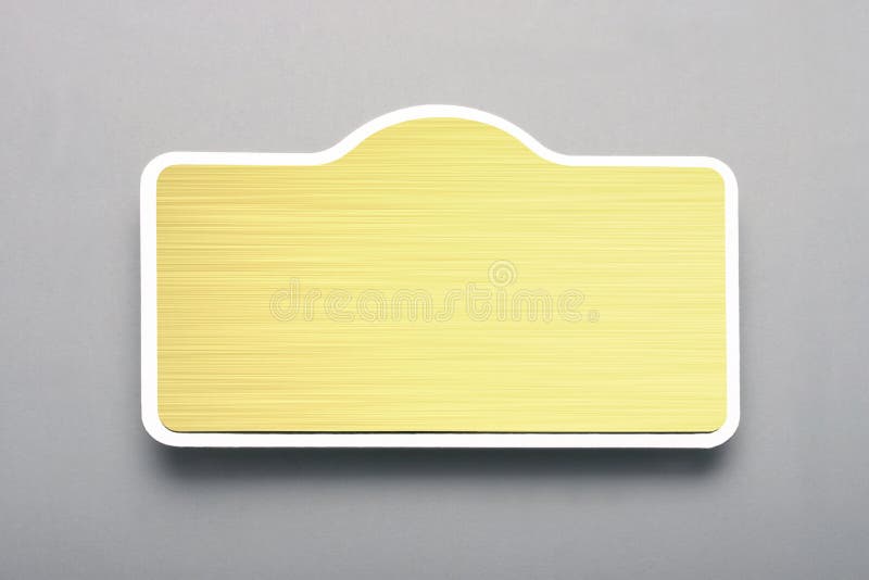Metal Name Plate for Insertion into Collar or Shirt Pocket. Stock Image