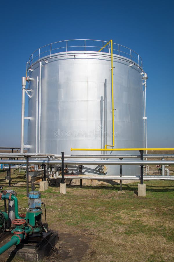 Metal oil tanks stock image. Image of drain, liquid, brown 34469417