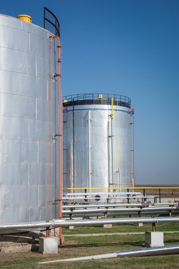 Metal oil tanks stock image. Image of drain, liquid, brown 34469417