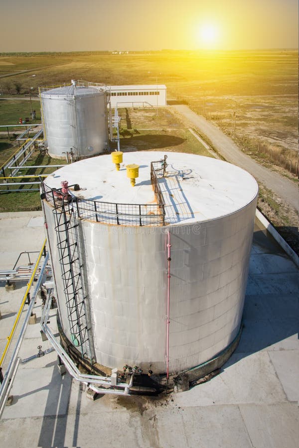 Metal oil tanks stock image. Image of liquid, urban, pipe 34470429