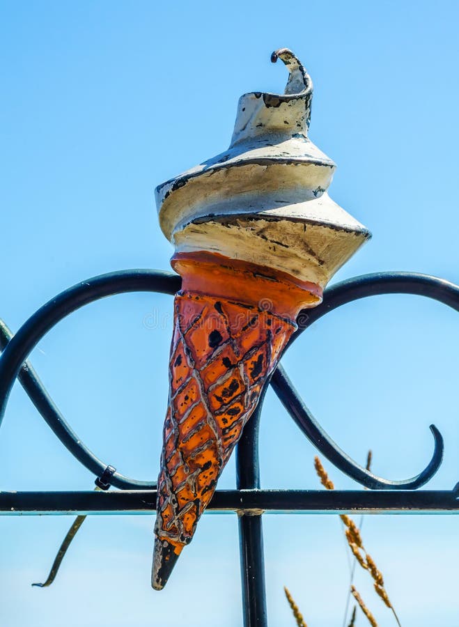 Metal Ornament on a Balustrade in a Seaside Village, a Symbolic Stock Metal Ornament on a Balustrade in a Seaside Village, a Symbolic Stock
