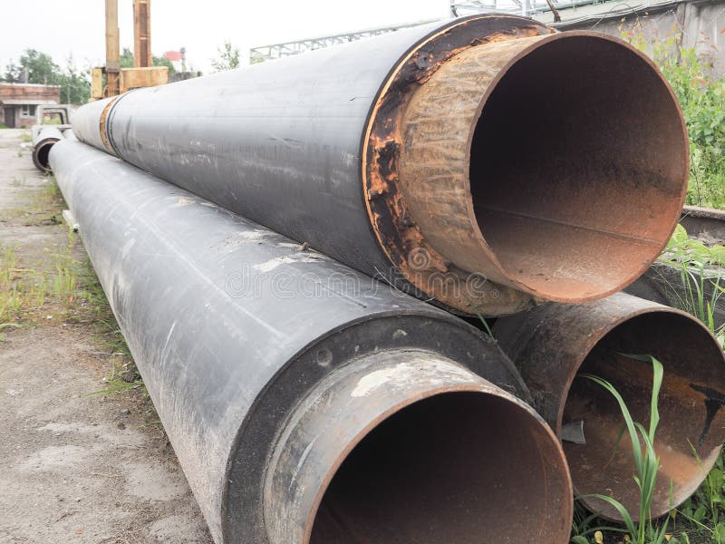 The Metal Pipe. Large Diameter Wide Metal Pipes Covered with a Layer of