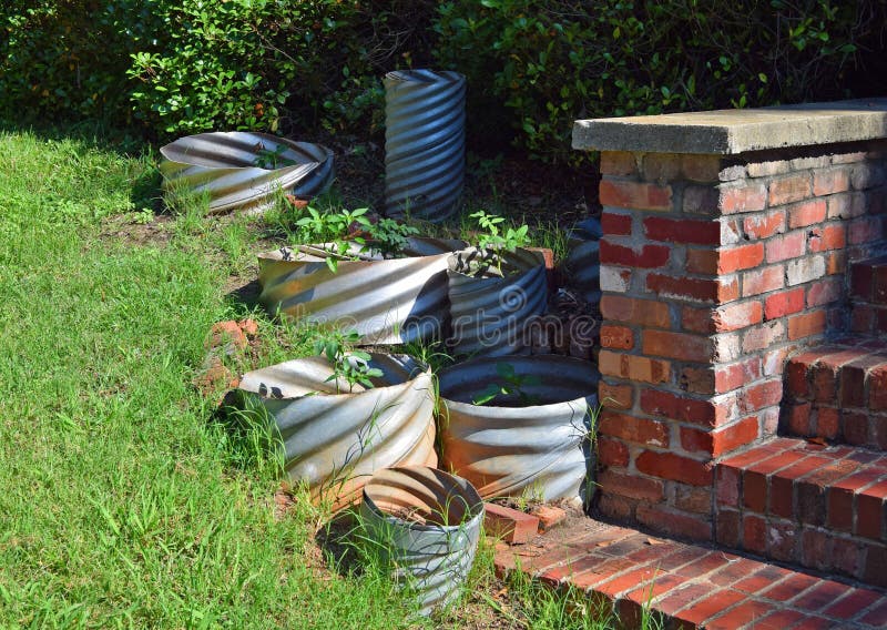 Metal pipe planters stock photo. Image of yard, pipes 98455720