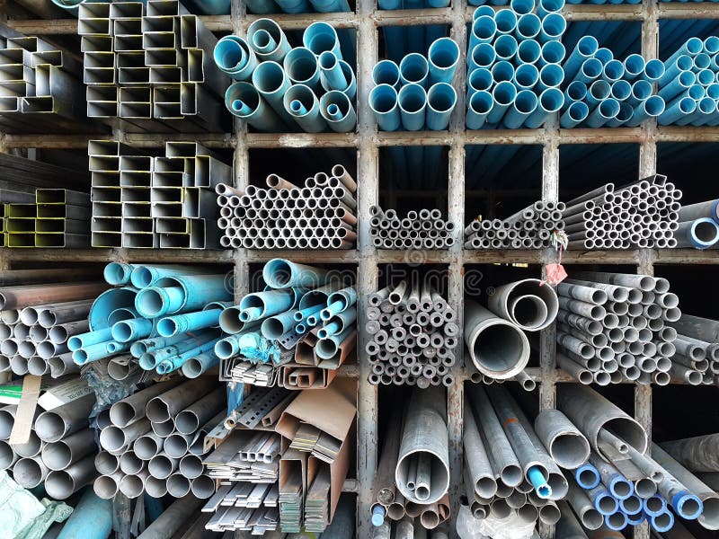 Metal Pipes and Pvc Pipes Stack on Shelf Stock Image Image of pipe