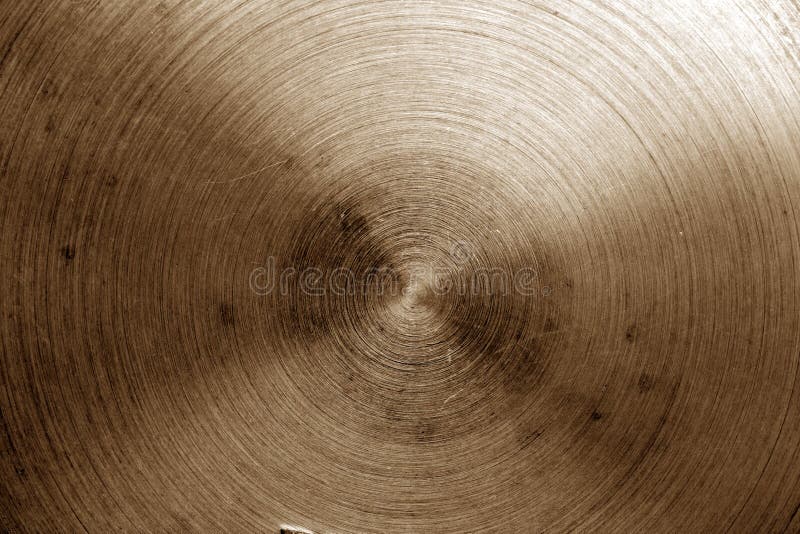 Metal surface with scratches in brown tone. Abstract background and texture for design. Metal surface with scratches in brown tone. Abstract background and texture for design.