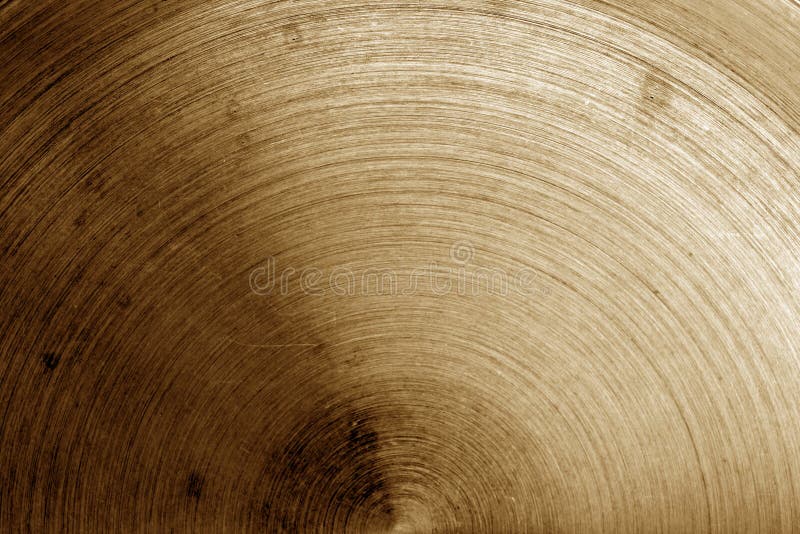 Metal surface with scratches in brown tone. Abstract background and texture for design. Metal surface with scratches in brown tone. Abstract background and texture for design.