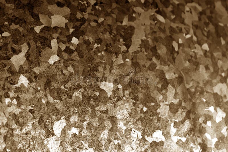 Metal surface with scratches in brown tone. Abstract background and texture for design. Metal surface with scratches in brown tone. Abstract background and texture for design.