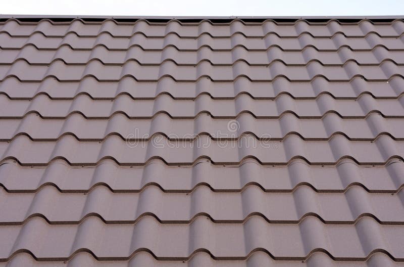 Roofing Materials. Metal House Roof. Closeup House Construction