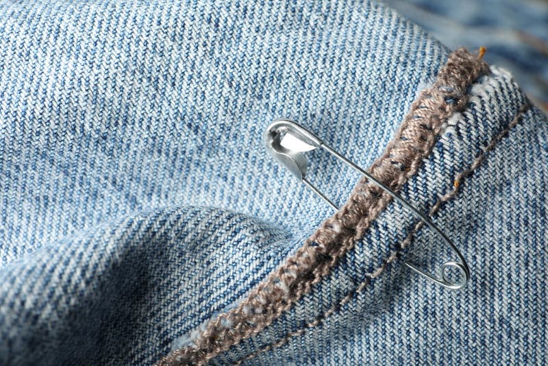 Metal Safety Pin On Denim Fabric, Closeup Stock Image Image of