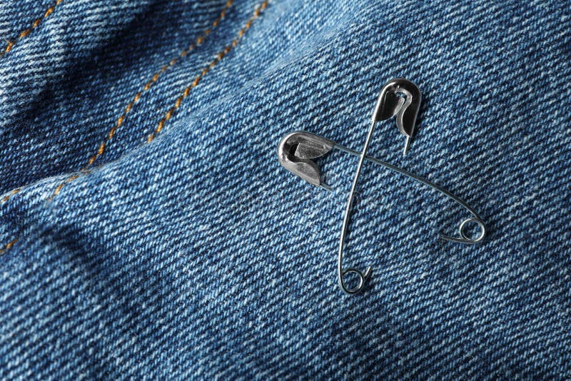 Metal Safety Pins on Denim Fabric, Closeup Stock Image - Image of luck ...