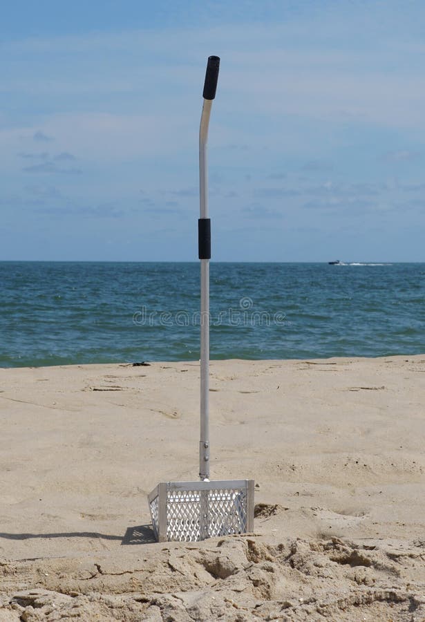 A Metal Sand Fleas Rake on the Beach Stock Image Image of catch