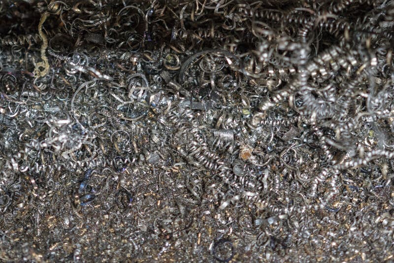 Metal shavings. The closeup of aluminium chips from CNC Milling machine process. stock image
