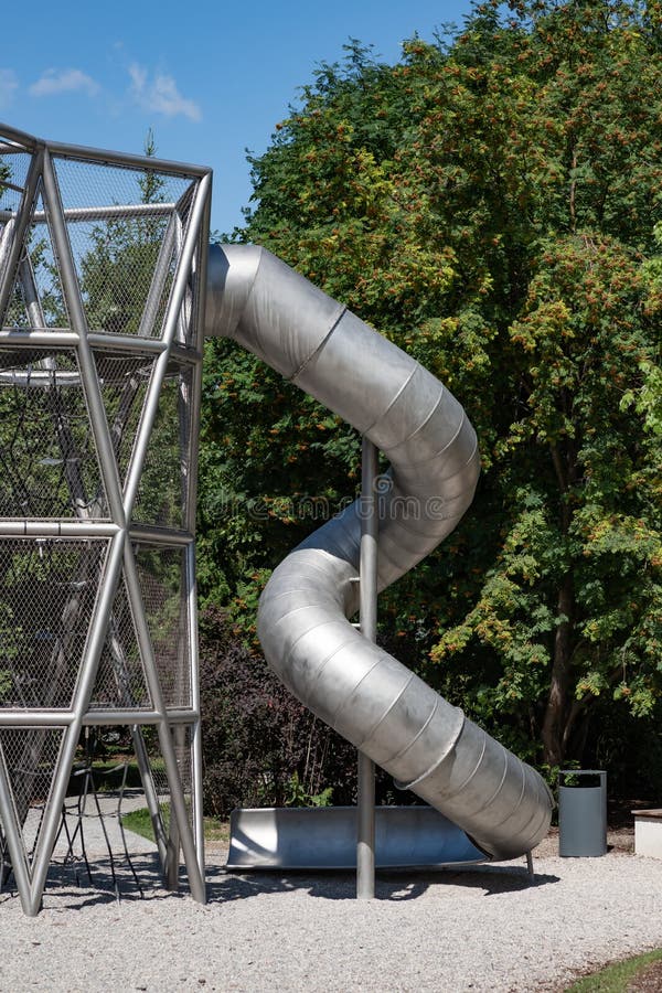 Metal spiral slide for children stock photos Metal spiral slide for children stock photos
