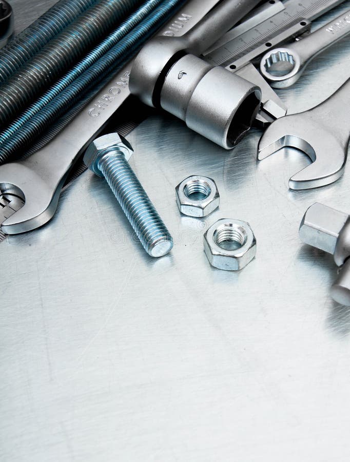 Metal Tools and Fixing Elements on the Scratched Stock Photo Image of
