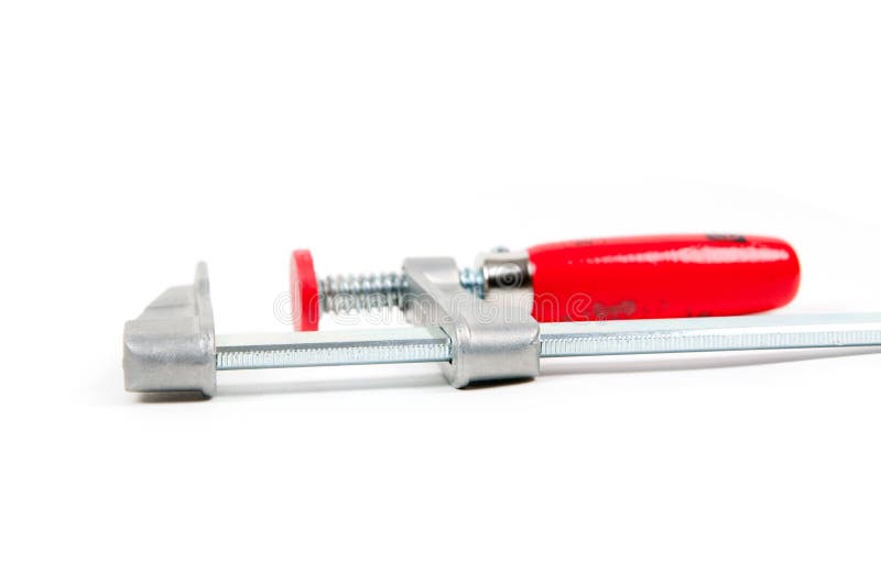 Metal vice with red handle royalty free stock photos