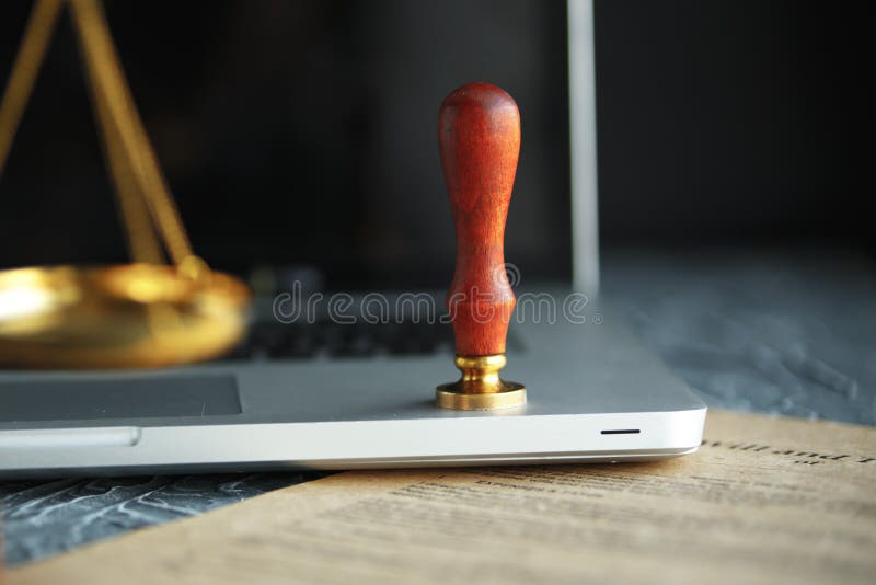 Metal wax notary public stamper on old document. Law royalty free stock images Metal wax notary public stamper on old document. Law royalty free stock images
