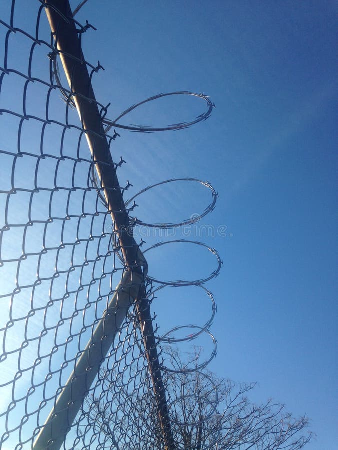 Metal Wire Security Fence. stock photo. Image of fall 62662872