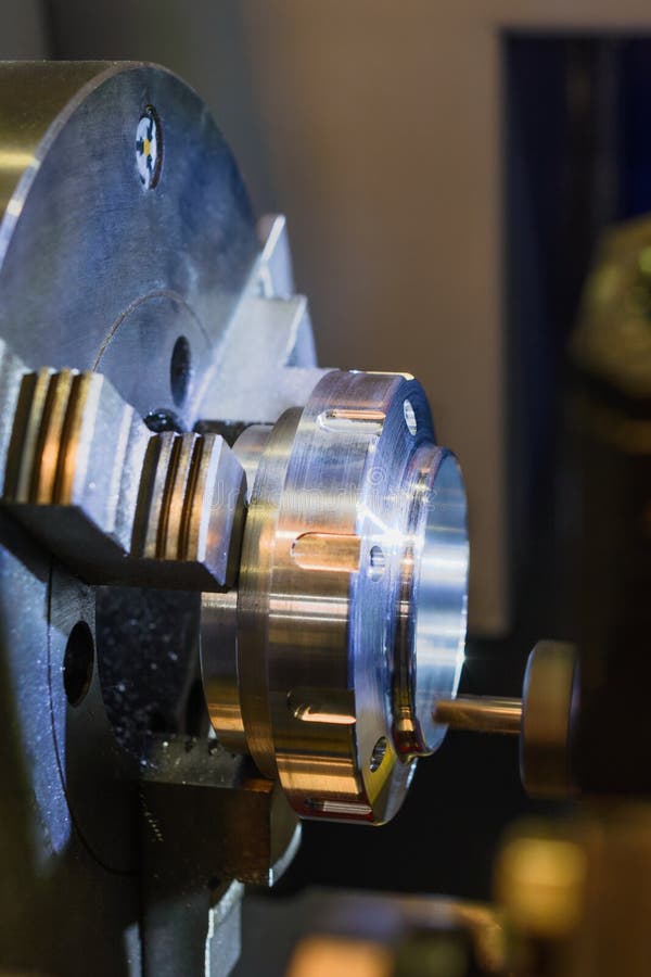 Metal Workpiece Clamped in the Lathe Chuck CNC Machine Stock Photo
