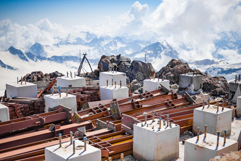 ELBRUS, RUSSIA - July 05: Metal piles and concrete cubes on the slope of Mount Elbrus in July 05, 2015 in Elbrus, Russia. ELBRUS, RUSSIA - July 05: Metal piles and concrete cubes on the slope of Mount Elbrus in July 05, 2015 in Elbrus, Russia