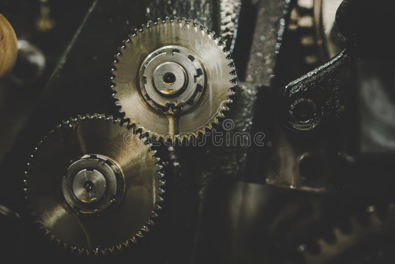 Metallic gear in the machinery in vintage style background royalty free stock images