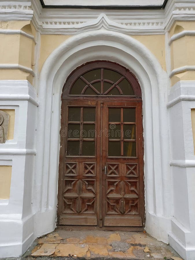 Metallic, Iron Door in a Thick Wall of an Old Building Stock Image