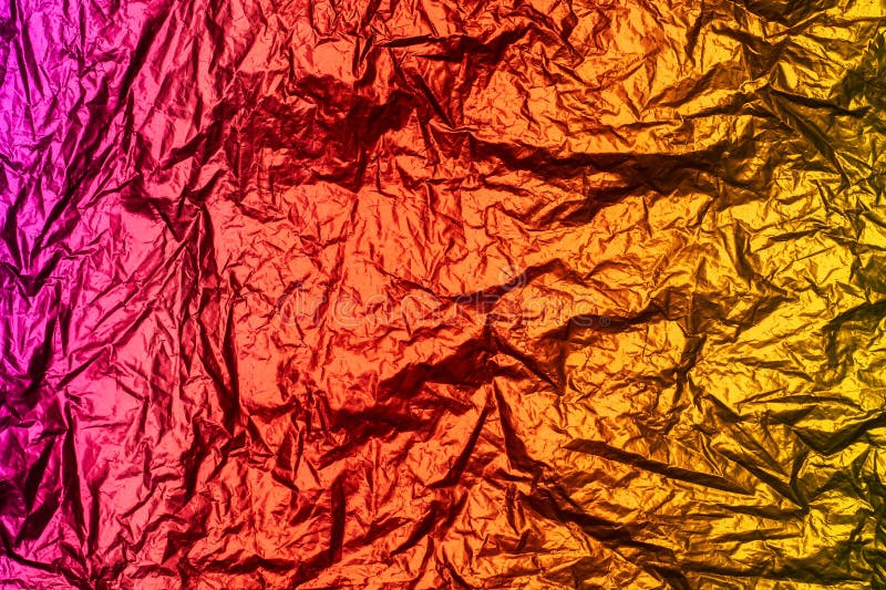 Metallic Rainbow Foil Texture for the Background. Warm Colors