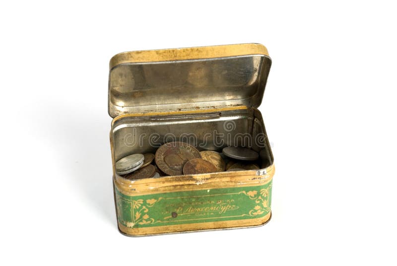 Metallrostiger Kasten mit Münzen stockbild Metallrostiger Kasten mit Münzen stockbild