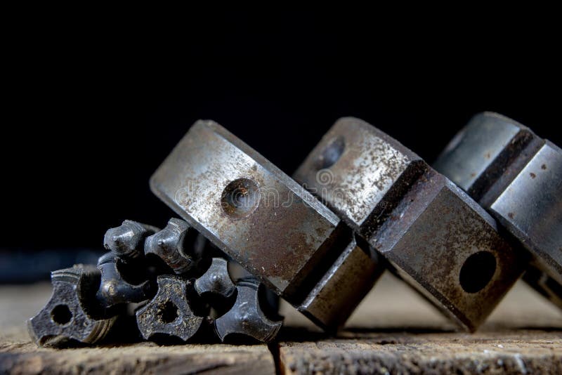 Metalwork tools on the workshop table. Threading dies and taps i royalty free stock image
