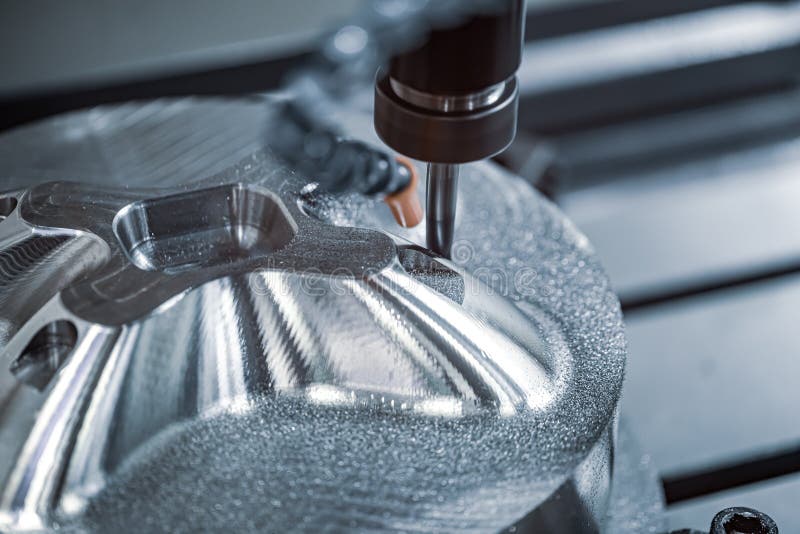 Metalworking CNC lathe milling machine. Cutting metal modern processing technology royalty free stock image