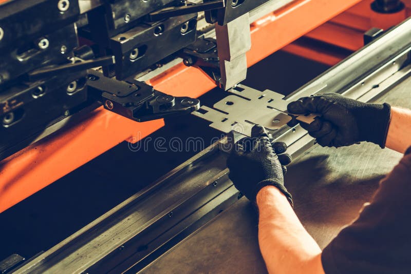 Metalworking Professional Worker Folding Piece Of Metal Element Using metalworking-professional-worker-folding-piece-of-metal-element-using