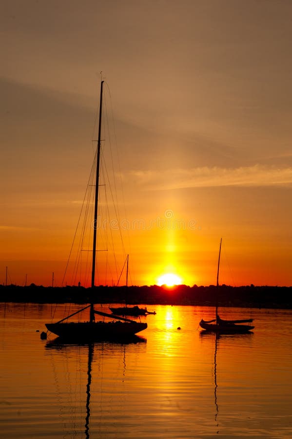 The 12 Meter Yacht Courageous. The 12 Meter Yacht and America's Cup Champion Courageous at sunrise in Newport, Rhode Isalnd royalty free stock photography The 12 Meter Yacht Courageous. The 12 Meter Yacht and America's Cup Champion Courageous at sunrise in Newport, Rhode Isalnd royalty free stock photography