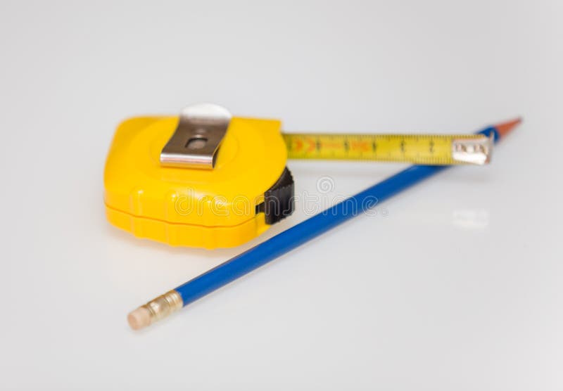 Meterstok en potlood royalty-vrije stock foto's