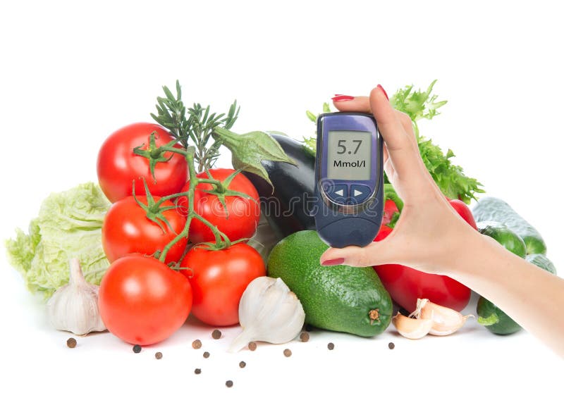 Metro de la glucosa del concepto de la diabetes a disposición y alimento biológico sano fotografía de archivo Metro de la glucosa del concepto de la diabetes a disposición y alimento biológico sano fotografía de archivo
