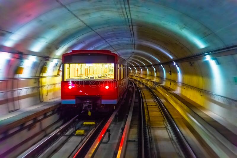 Metro train in subway underground tunnel