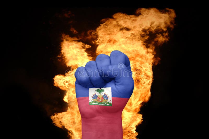 Mettez le feu au poing avec le drapeau national du Haïti