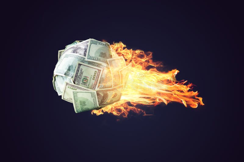 Fire money ball of dollar bills going up like a comet in space. The concept of the rapid development of financial profit. Fire money ball of dollar bills going up like a comet in space. The concept of the rapid development of financial profit