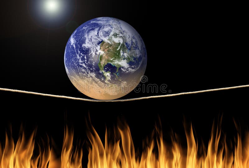 Mettez à la terre l'équilibrage sur la corde raide au-dessus du message environnemental de changement climatique du feu