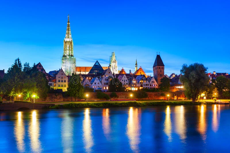 Metzgerturm Tower, Ulm Minster Church or Ulmer Munster Cathedral and Danube river in Ulm old town. Ulm Minster Church is currently the tallest church in the world. Metzgerturm Tower, Ulm Minster Church or Ulmer Munster Cathedral and Danube river in Ulm old town. Ulm Minster Church is currently the tallest church in the world