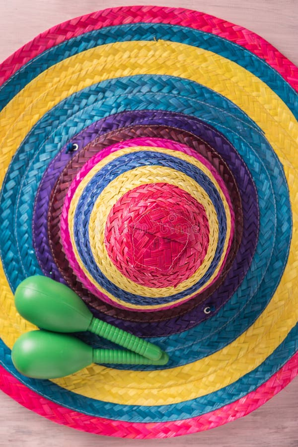 Mexican background with sombrero and maracas