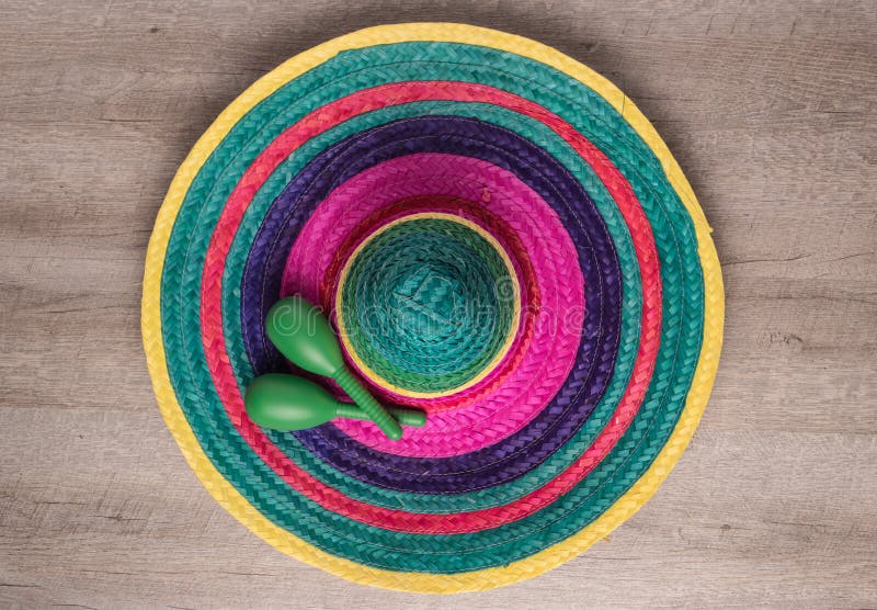 Mexican background with sombrero and maracas