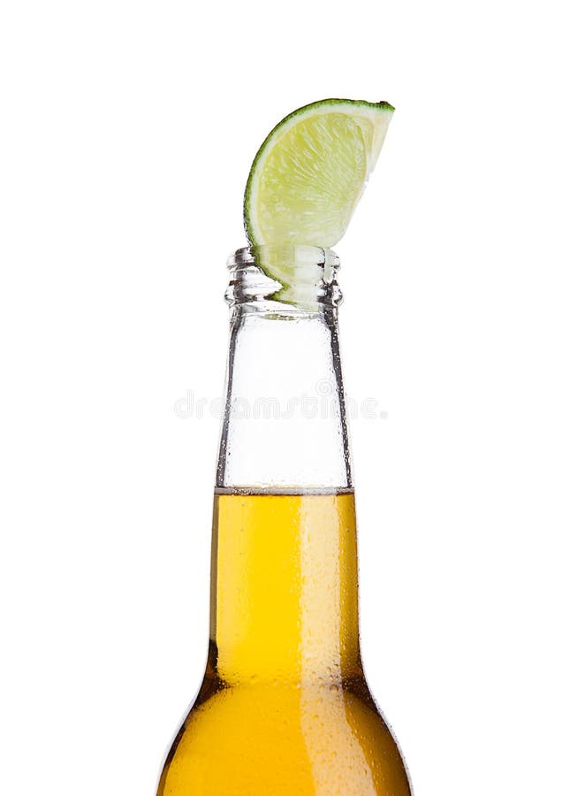 Mexican beer bottle with lime slice and frost