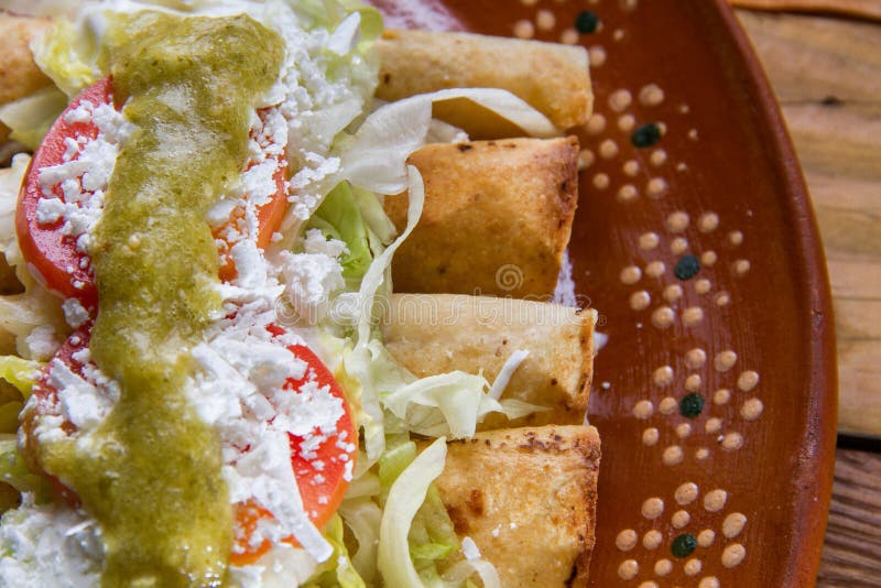 Mexican flautas stock image. Image of avocado, taquito 11058873