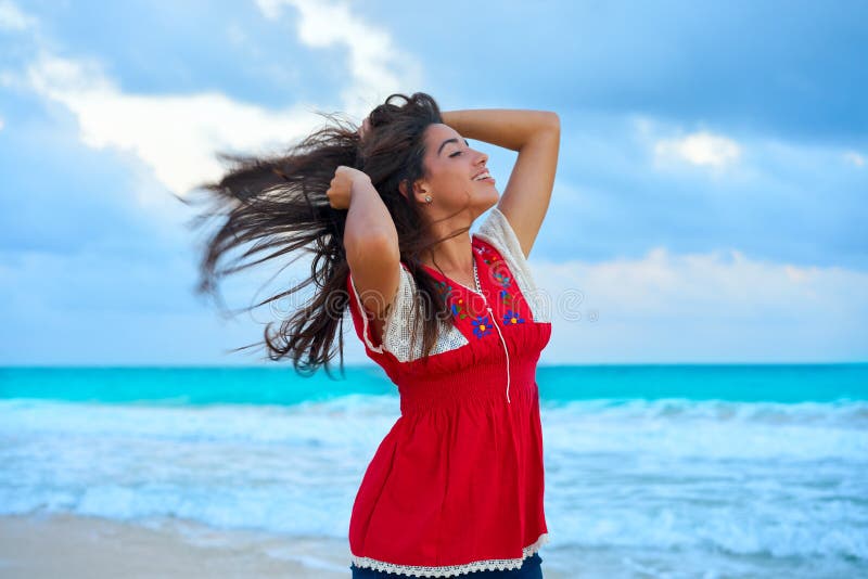 Mexican girl embrodery dress at sunset