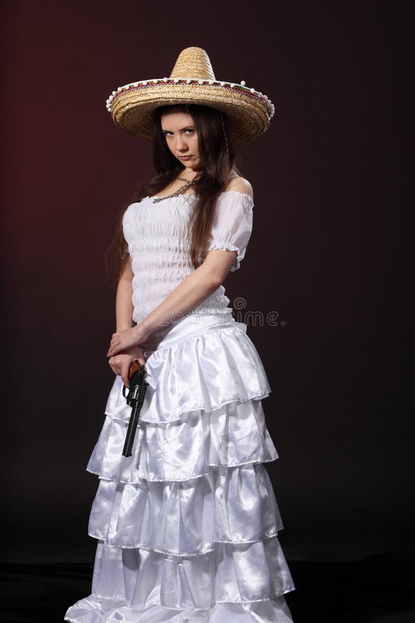 Mexican girl hold revolver