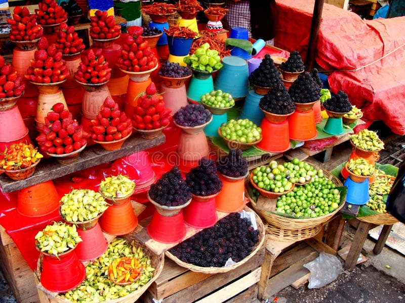 Colorful fruit and vegetable market in Mexico. This particular market is used mostly by the locals for their everyday shopping for groceries and household items. Food vendor sold stock images, royalty-free photos and pictures
