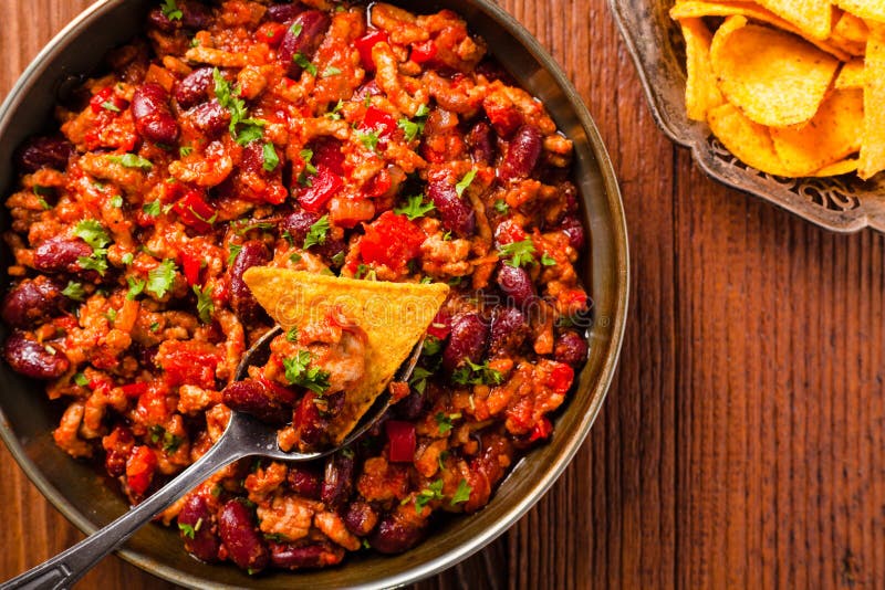 Nachos with chili beans stock photo. Image of spicy, colorful 43644276