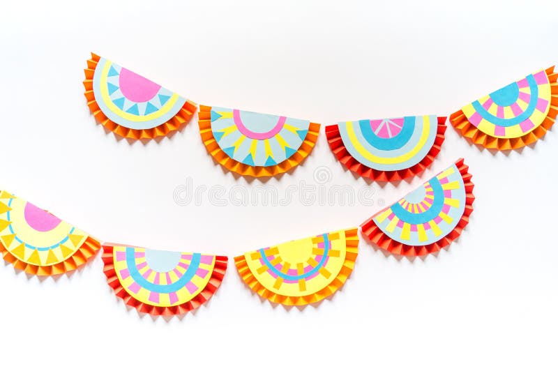Mexican paper garlands decorating. Cinco De Mayo colorful traditional picado banner festive. Creativity paperwork. Step by step skill
