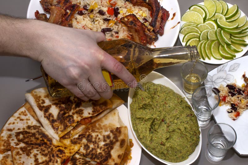 Mexican Party. Tequila and Traditional Mexican Dishes Stock Image